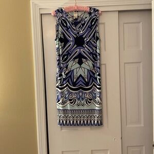 Sleeveless knee length h lightweight summer dress with small pocket in front.